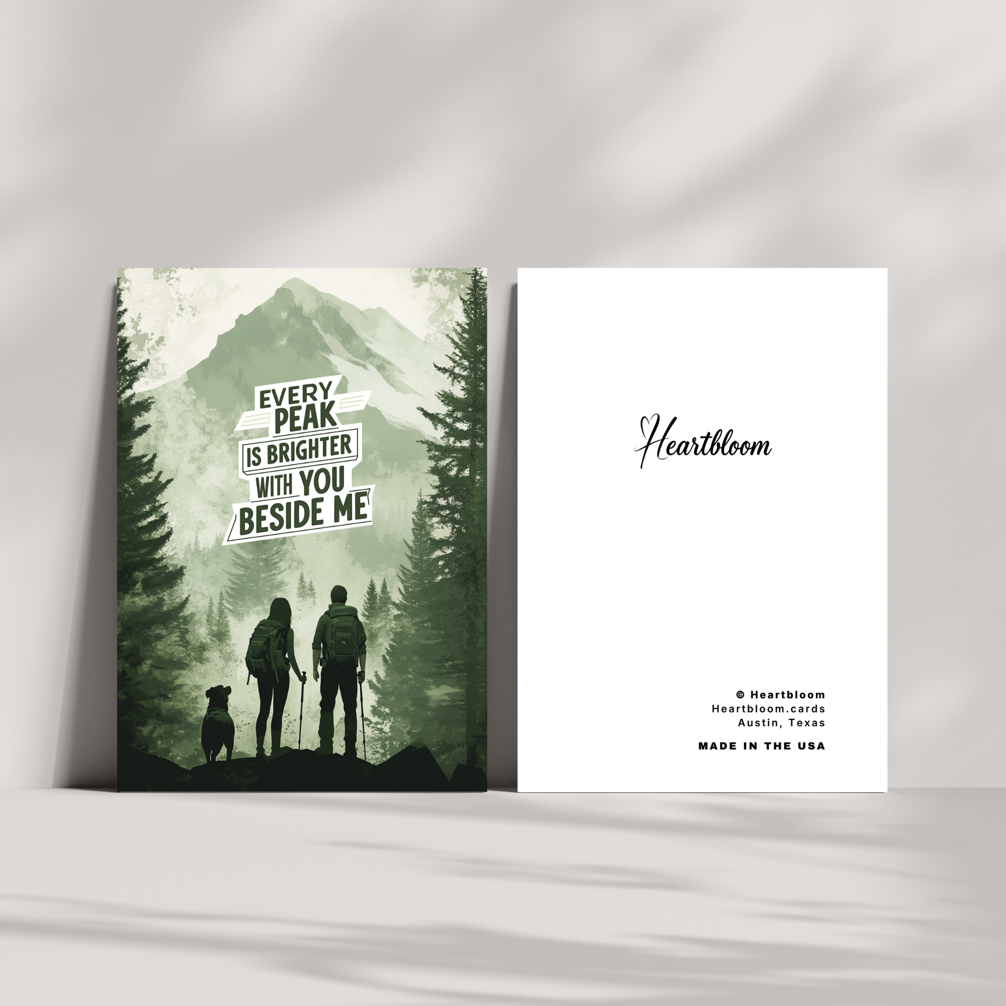 Card with mountain scene and text 'Every peak is brighter with you beside me' by Heartbloom.