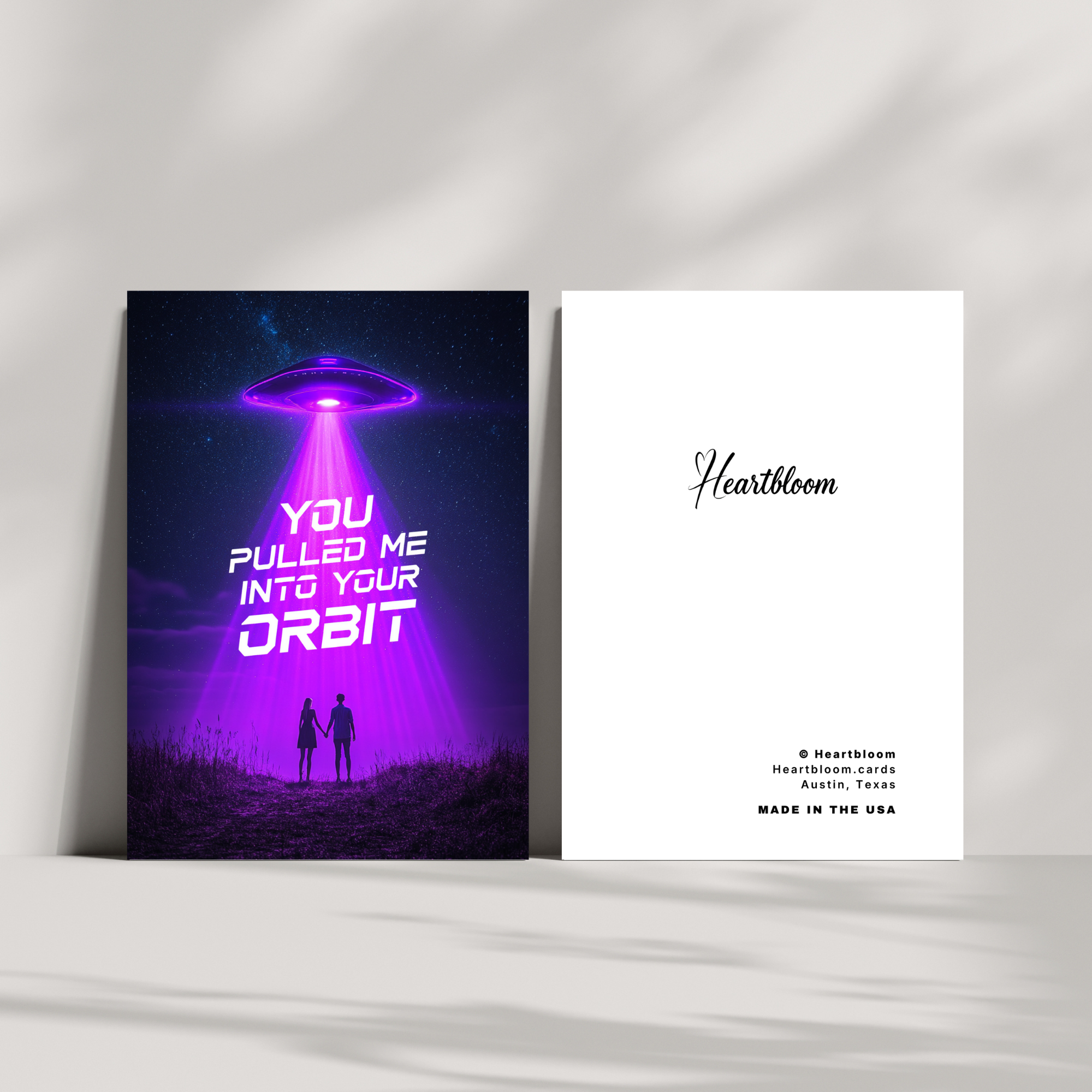 Card with UFO design and text 'You pulled me into your orbit' on a white background