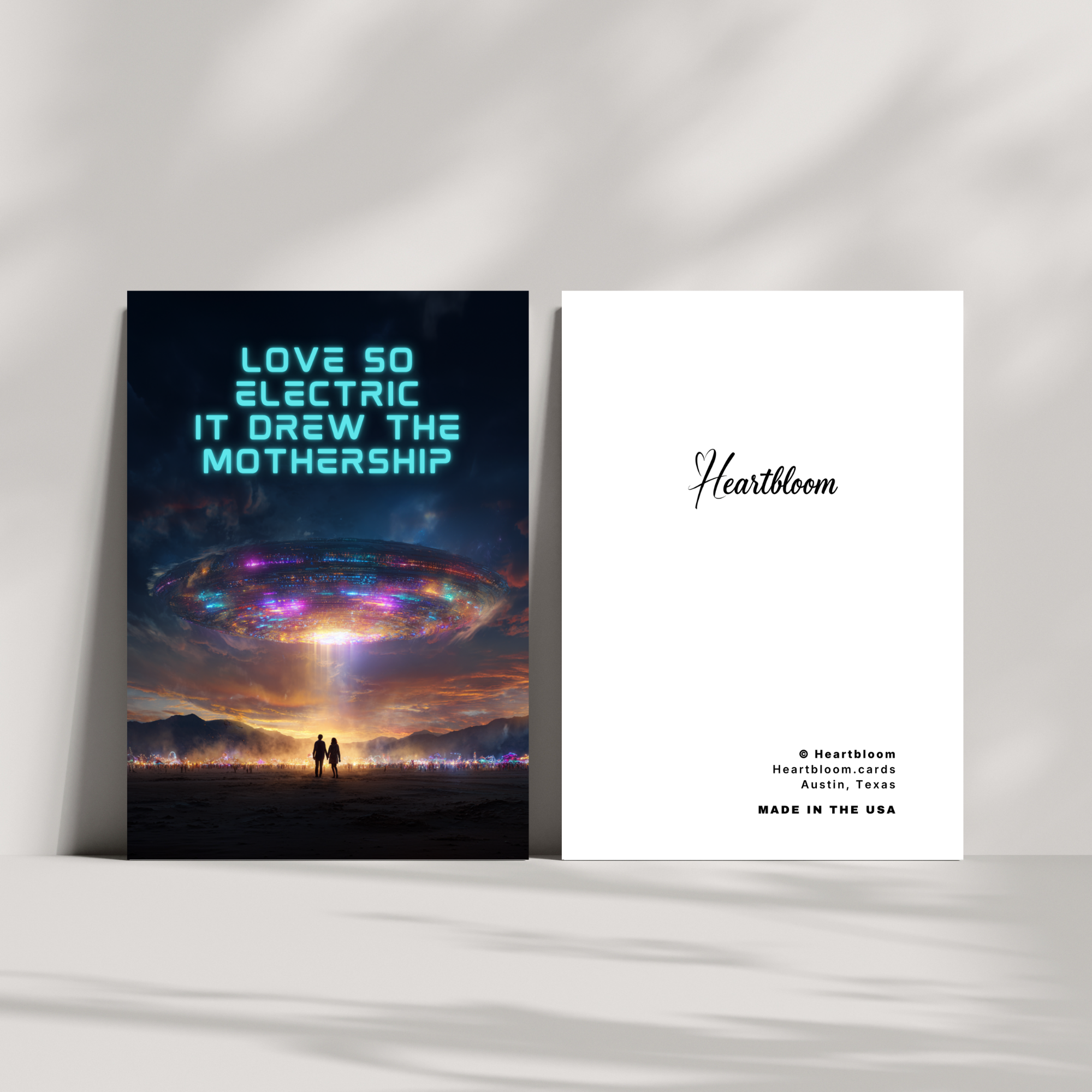 Two cards with a futuristic design and 'Heartbloom' branding on a white surface.