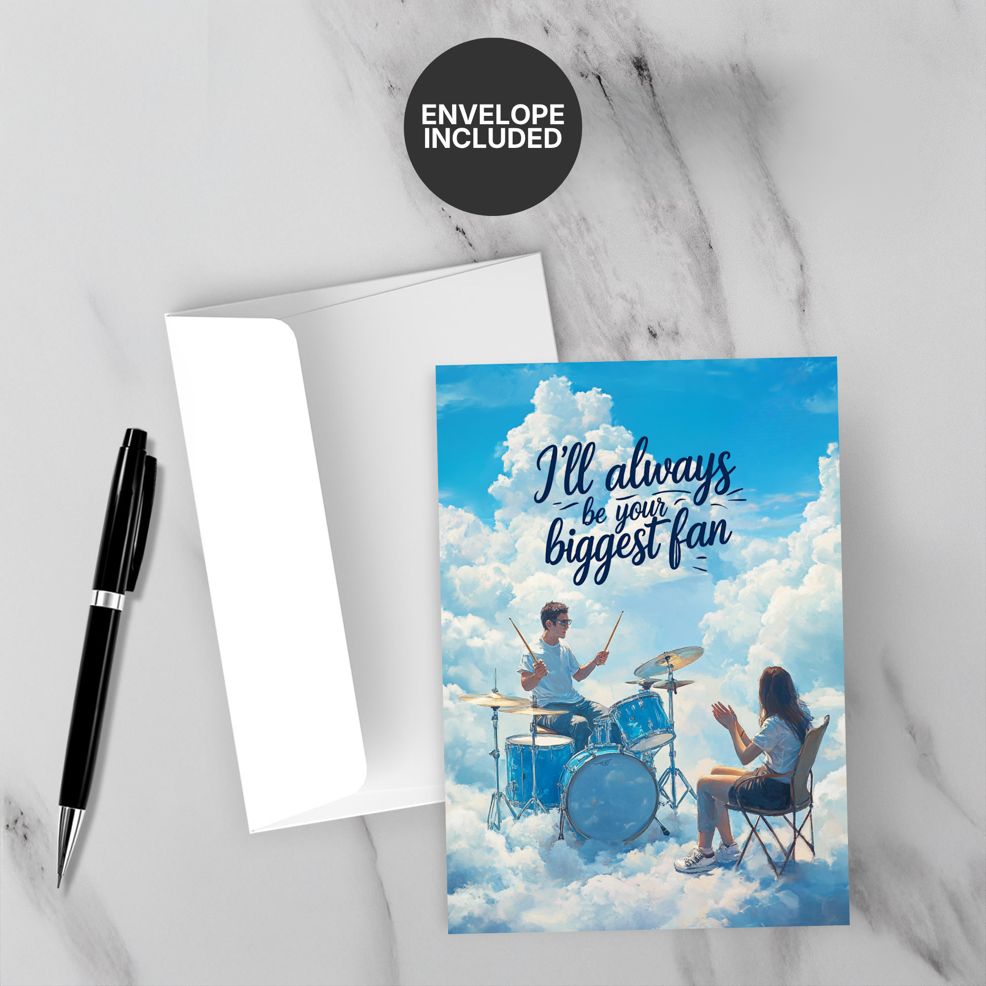 Greeting card with a drummer and fan in the clouds, envelope included, on a marble surface.