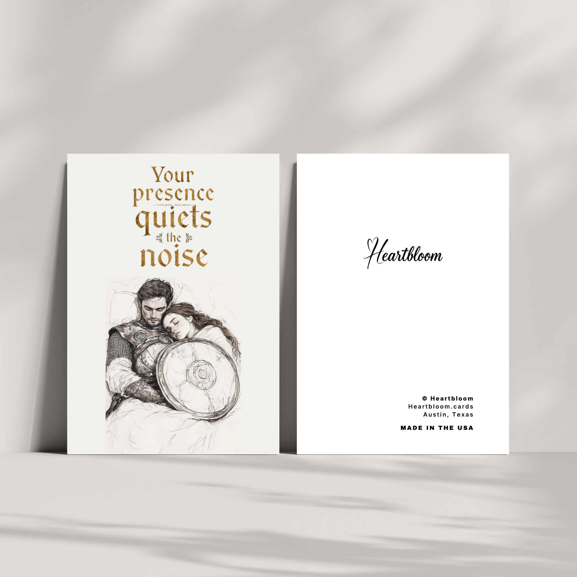 Card with illustration of a couple and text 'Your presence quiets the noise' by Heartbloom on a gray background