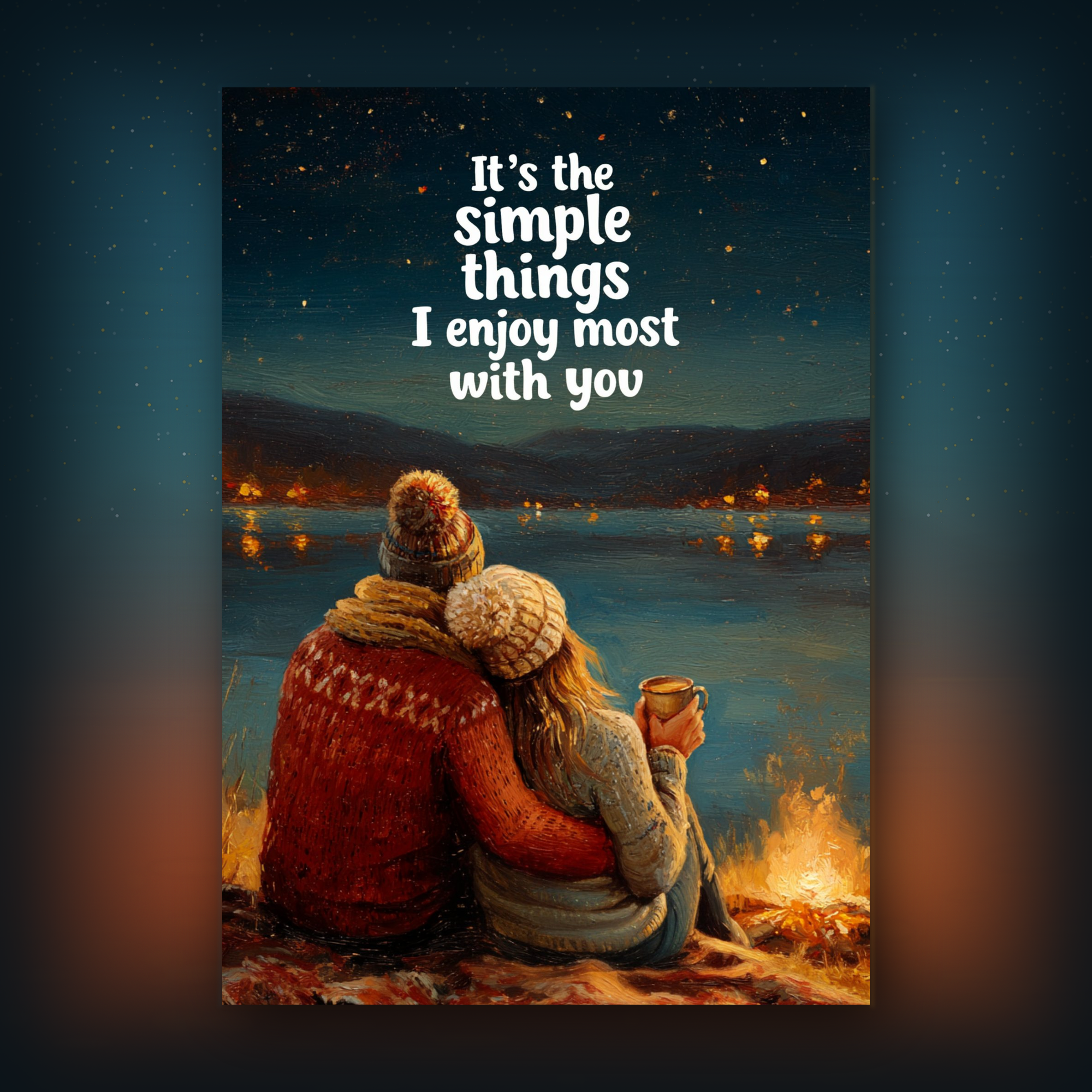 Card of a couple by a campfire with a romantic quote against a night sky over water.