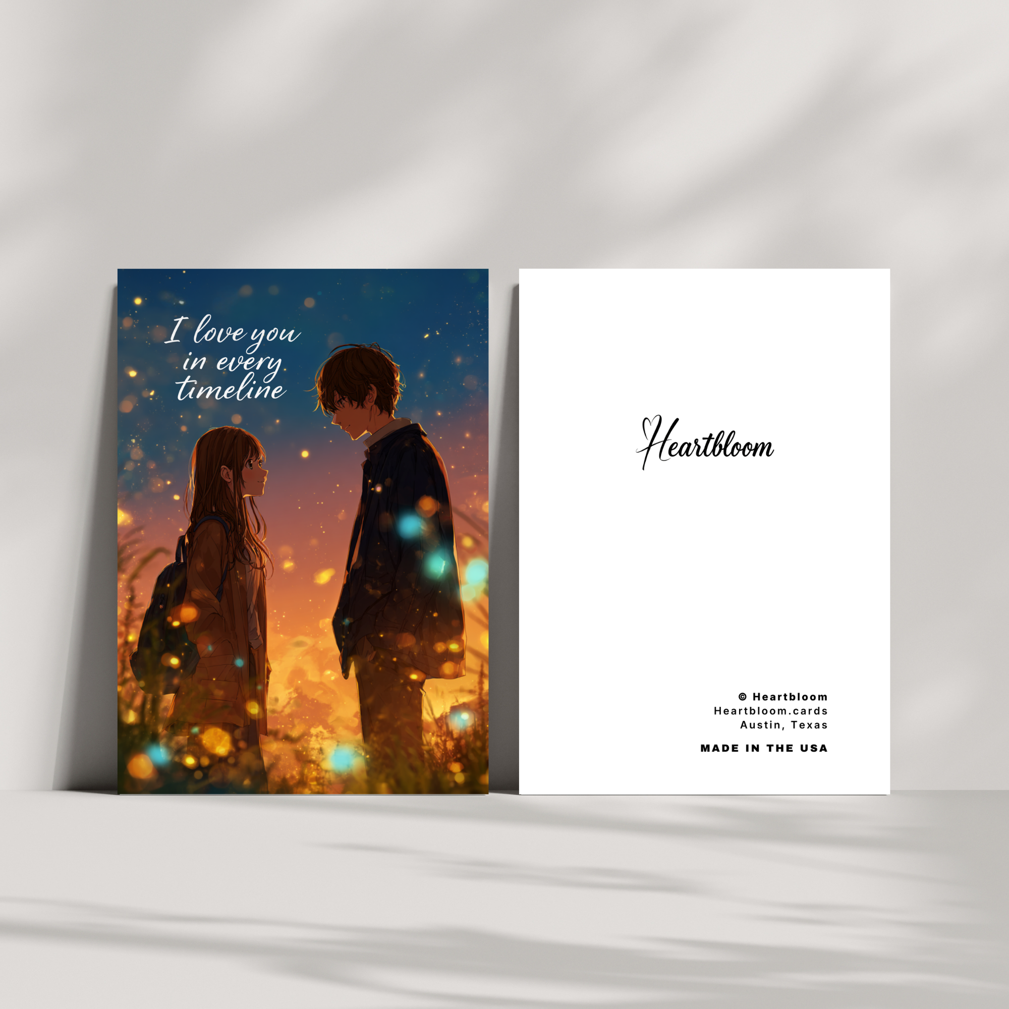 Card with a couple's silhouette and 'I love you in every timeline' text, featuring the brand 'Heartbloom'.