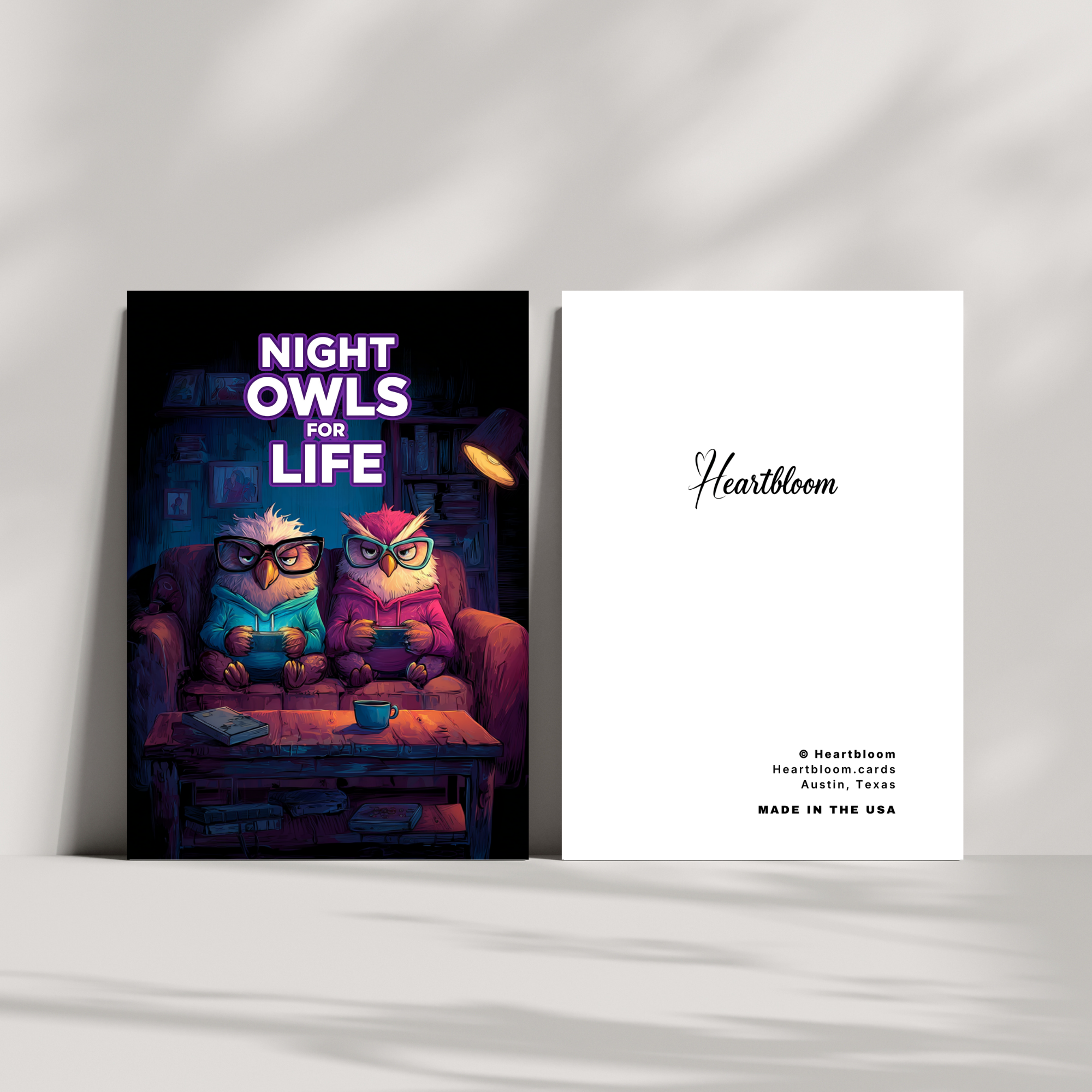 Two owl-themed greeting cards on a white surface with 'Heartbloom' branding.