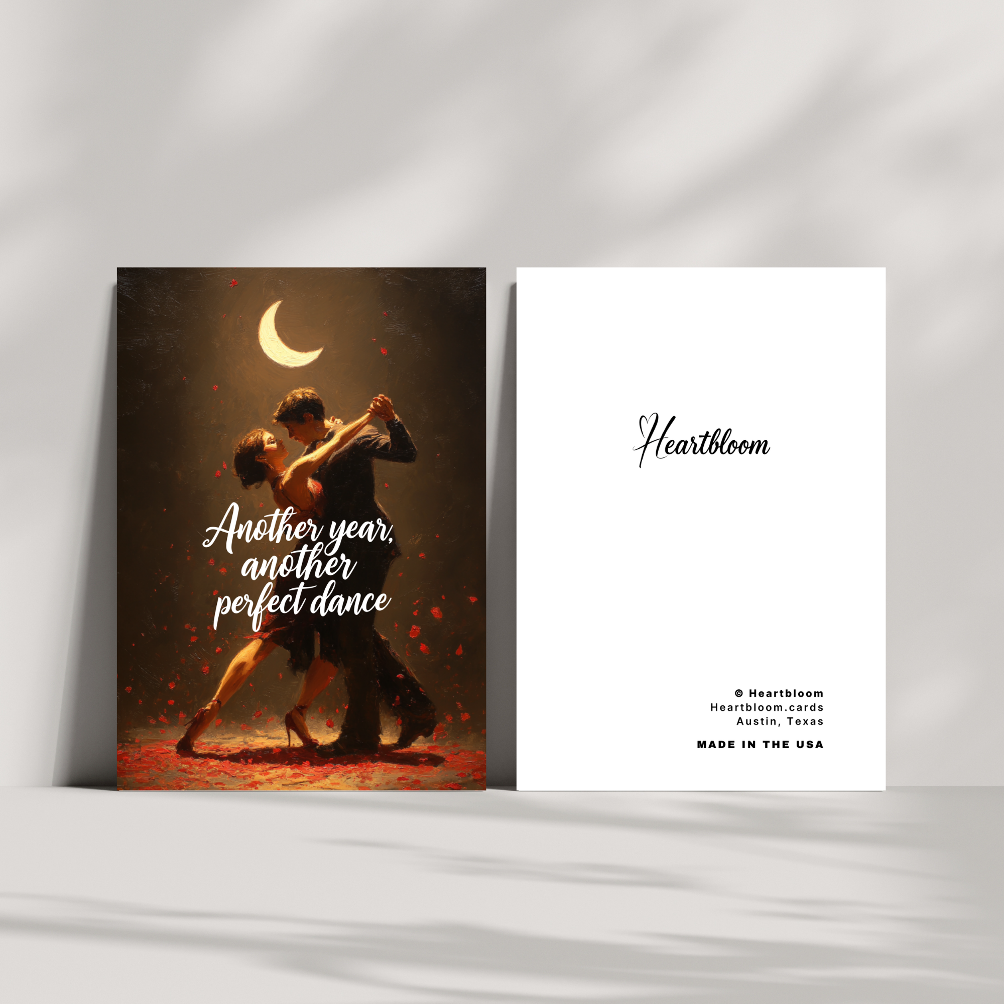 Two greeting cards featuring a couple dancing under a moonlit sky with 'Heartbloom' branding.