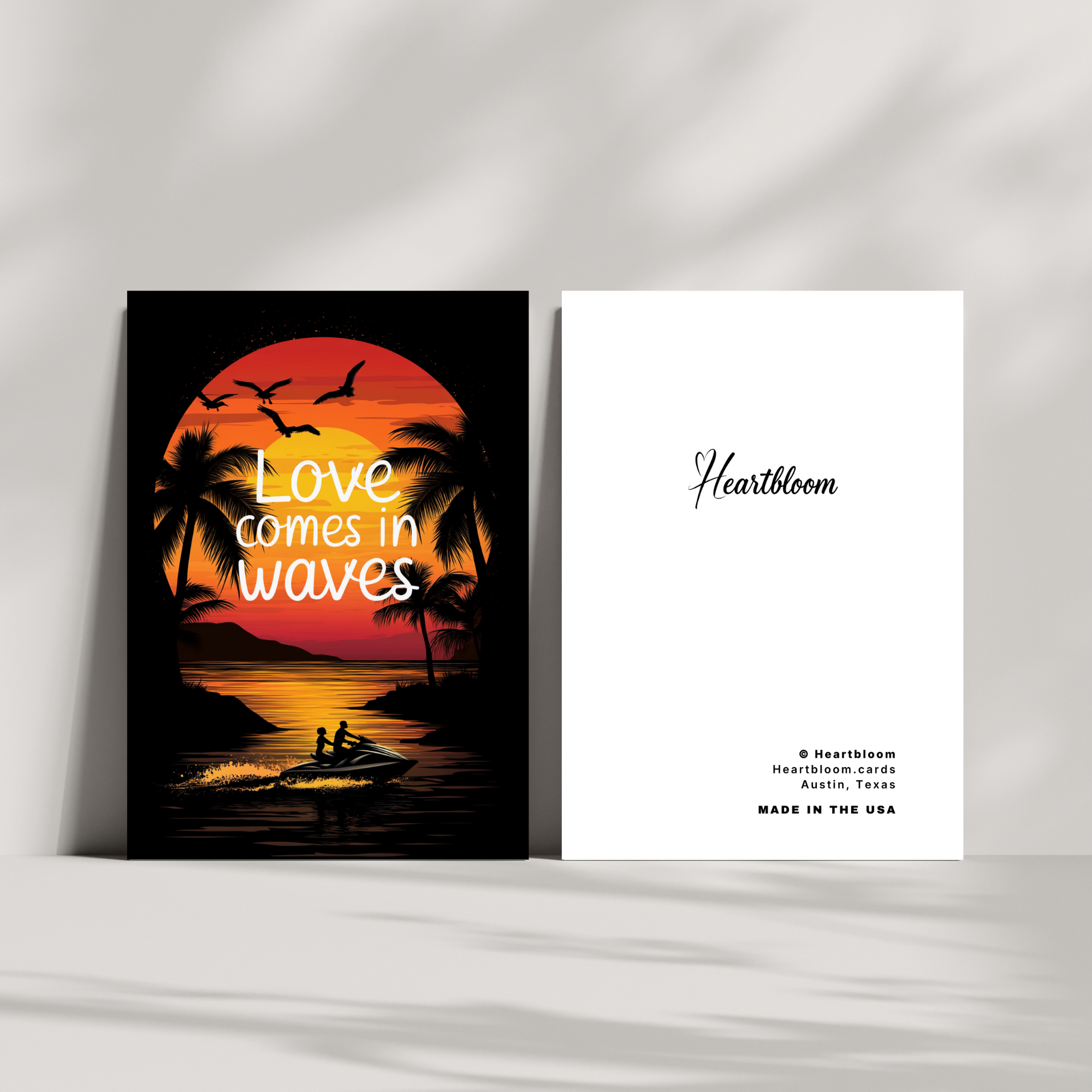 Card of surreal artwork with 'Love comes in waves' text and 'Heartbloom' branding on a white background.