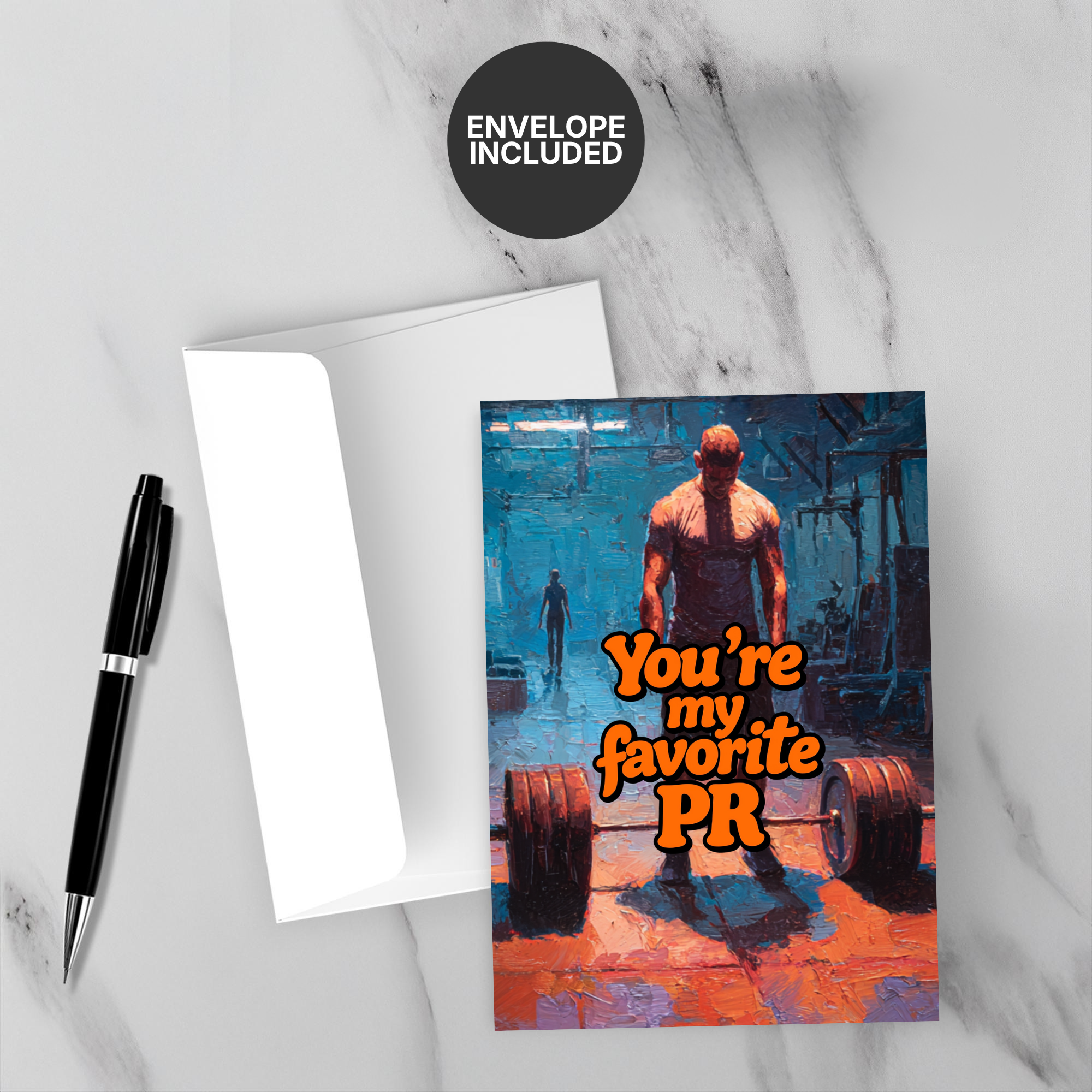 Greeting card with a weightlifter and 'You're my favorite PR' text, accompanied by a pen and envelope on a marble surface.