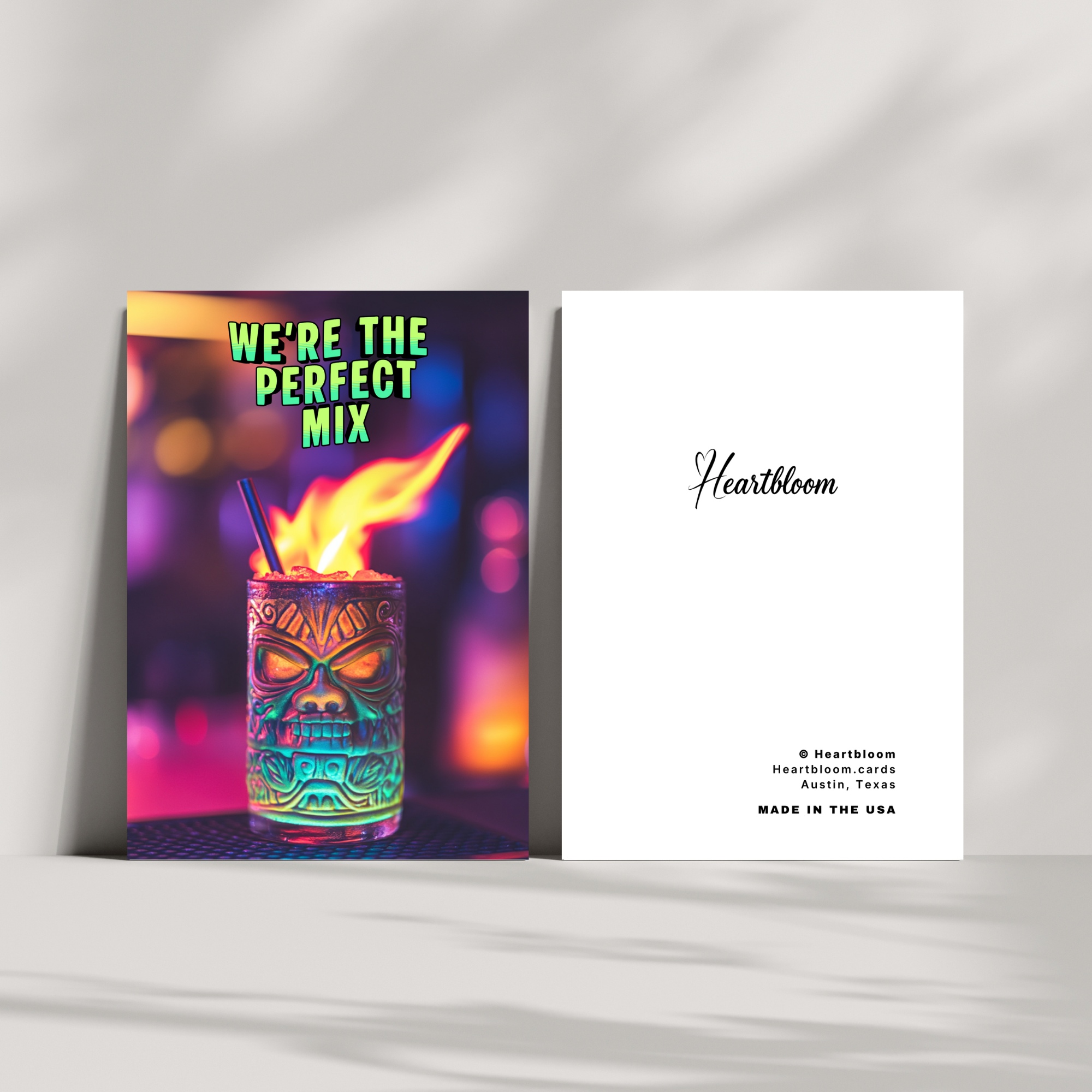 Card for Heartbloom with a colorful drink and text 'We're the Perfect Mix'.