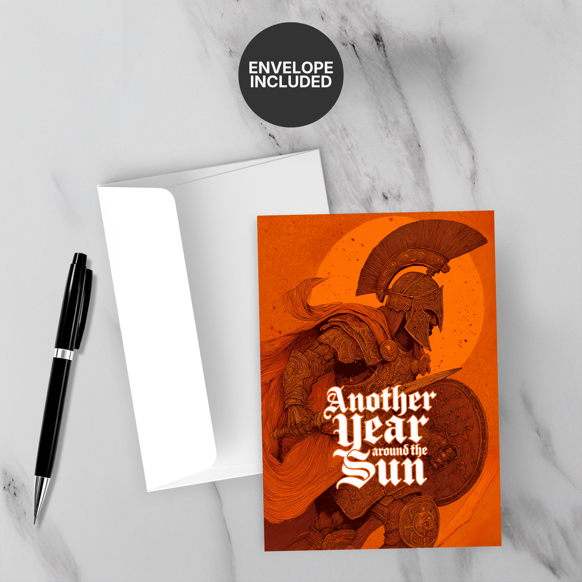 Greeting card with warrior design and 'Envelope Included' label on marble surface