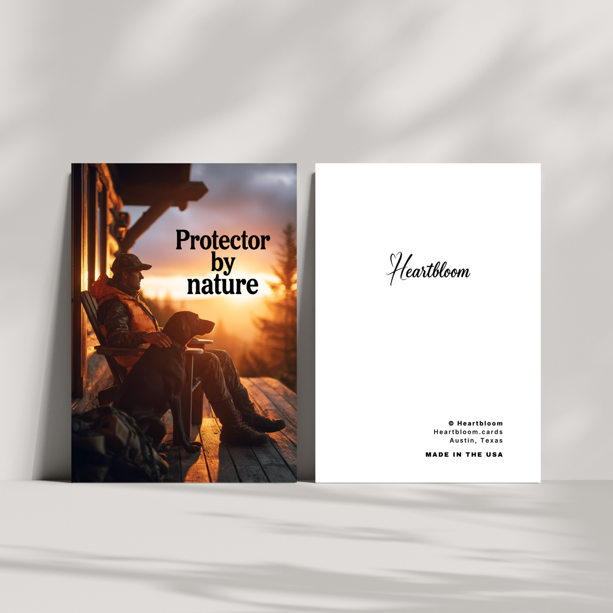 Card with a man and dog on a wooden deck, sunset, and 'Heartbloom' branding.