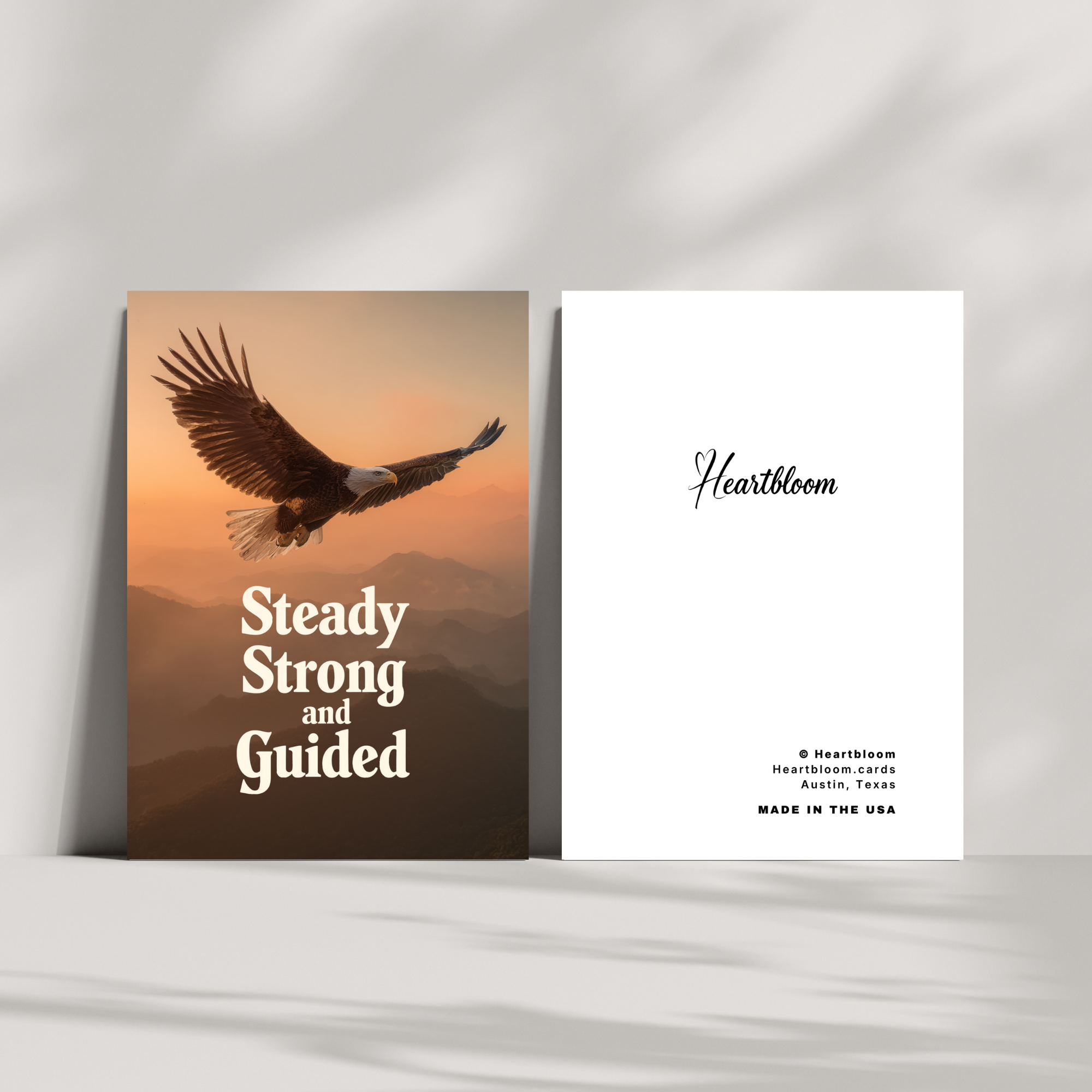 Card with an eagle design and 'Heartbloom' branding on a white background