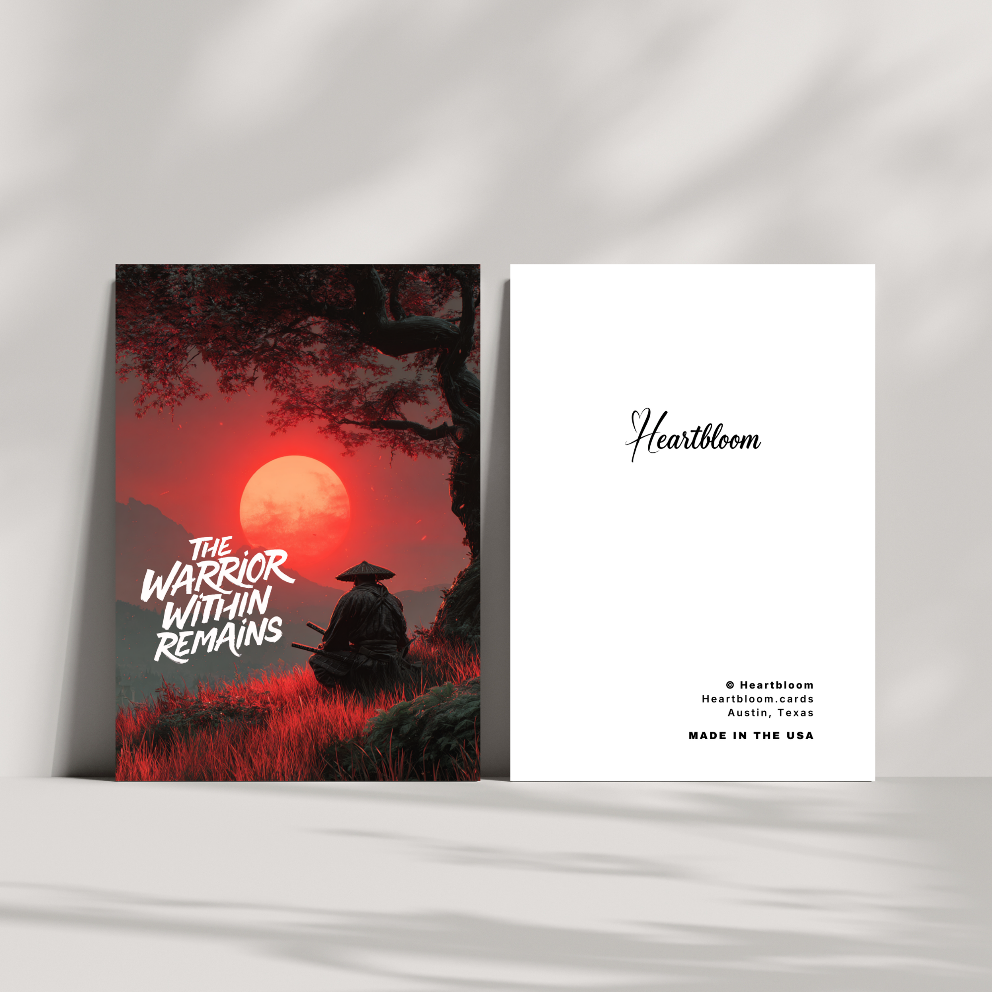 Card with a warrior silhouette and red moon, featuring 'Heartbloom' branding.