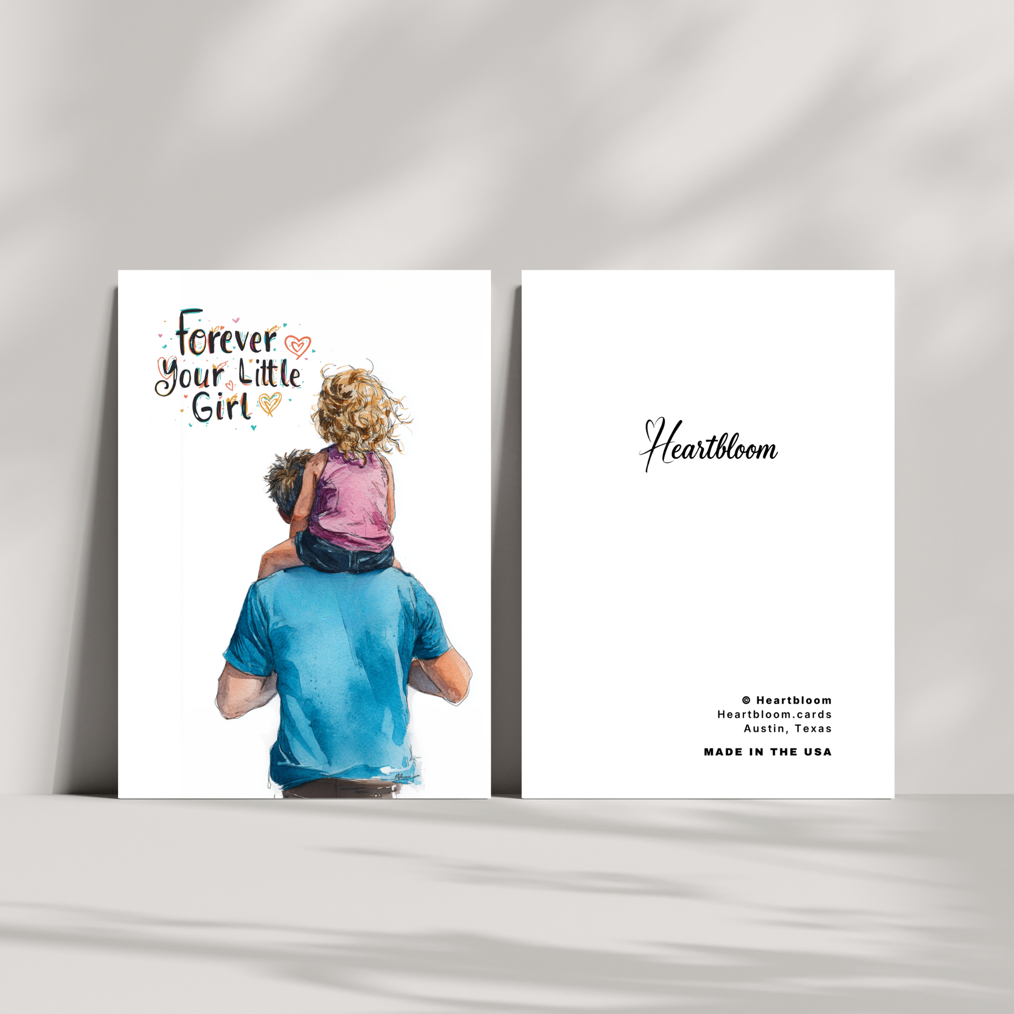 Card with illustration of a man holding a child and text 'Forever Your Little Girl' by Heartbloom on a white background.
