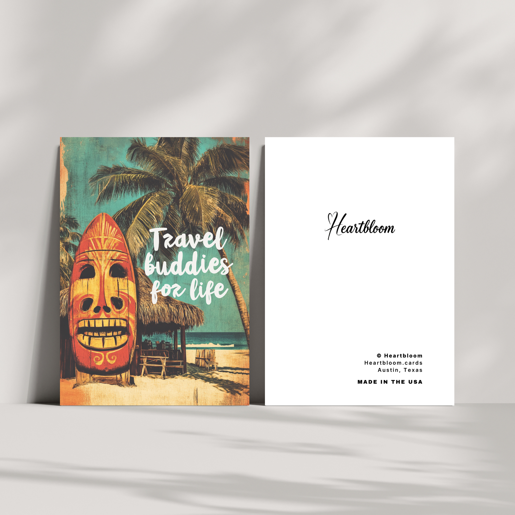 Card with tropical design and 'Heartbloom' branding on a white background