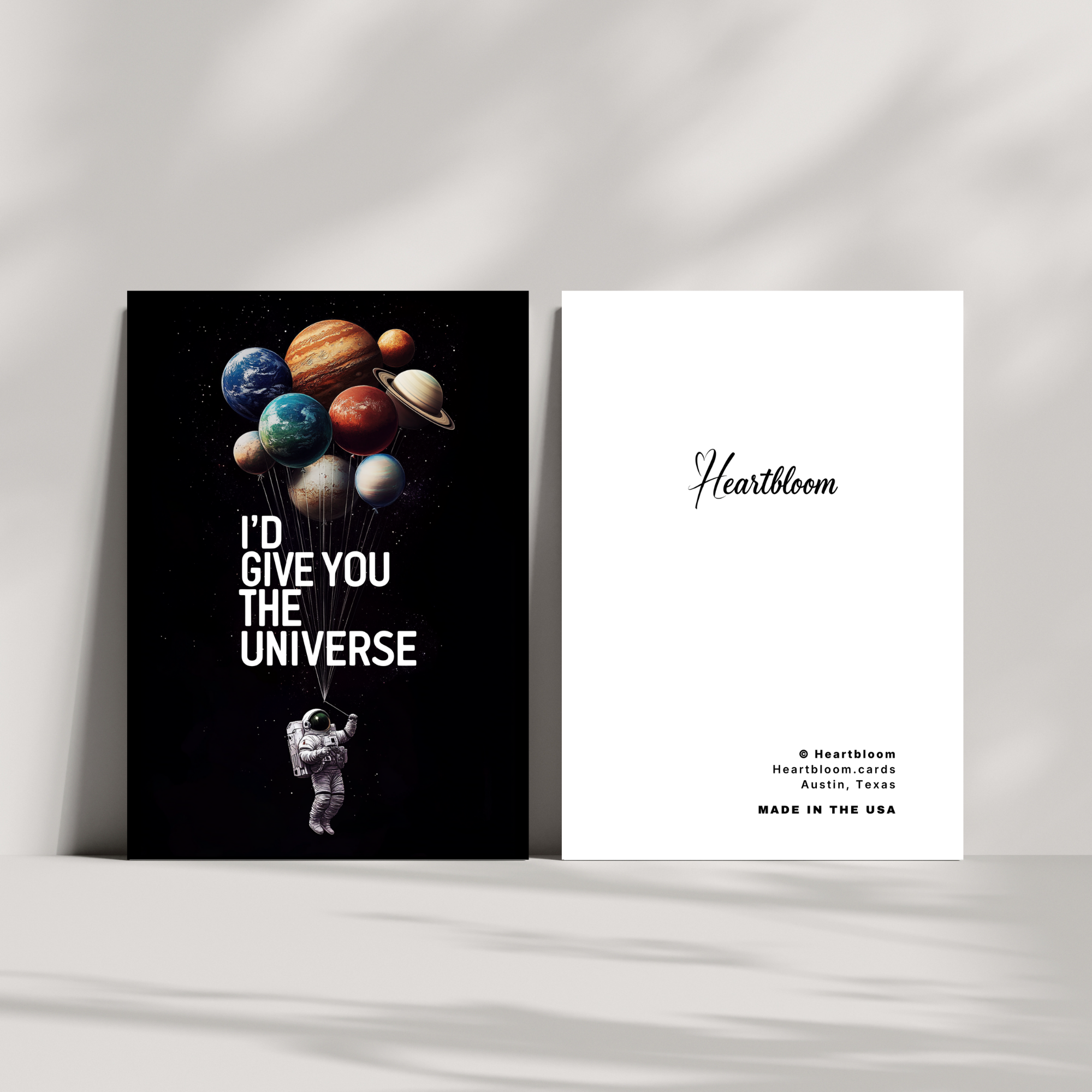Card with space-themed design and 'Heartbloom' branding on a white background