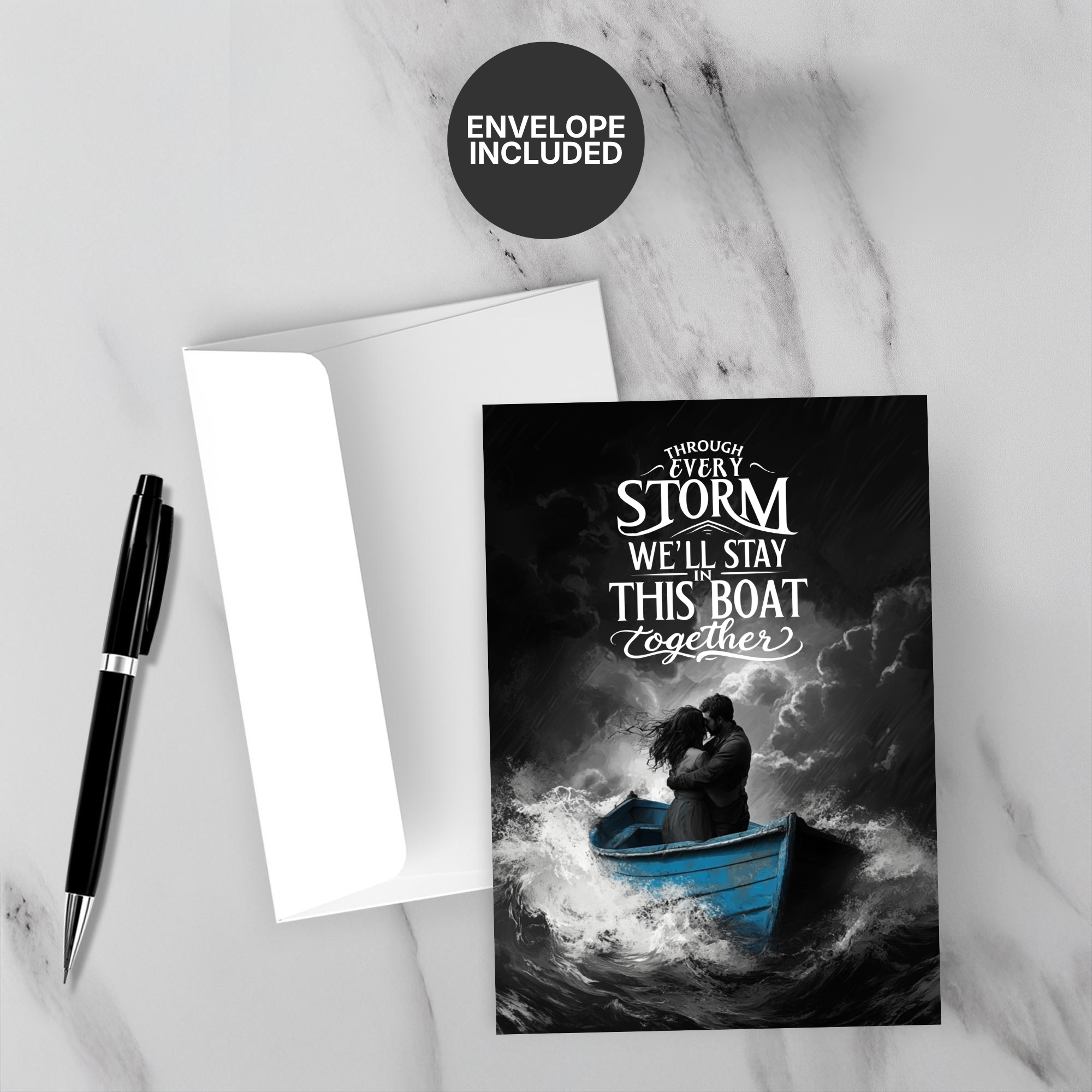 Greeting card with a couple in a boat amidst stormy waves, text 'Through every storm we'll stay this boat together', and an envelope on a marble surface.