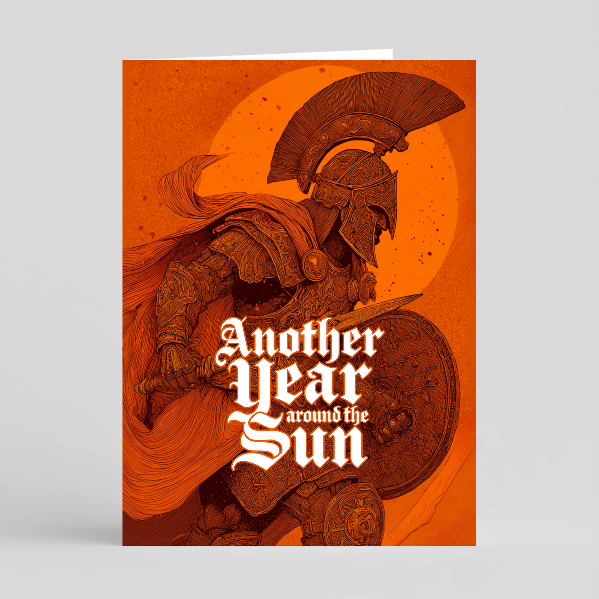 Card of glorious warrior with helmet and shield against an orange background with 'Another Year around the Sun' text.