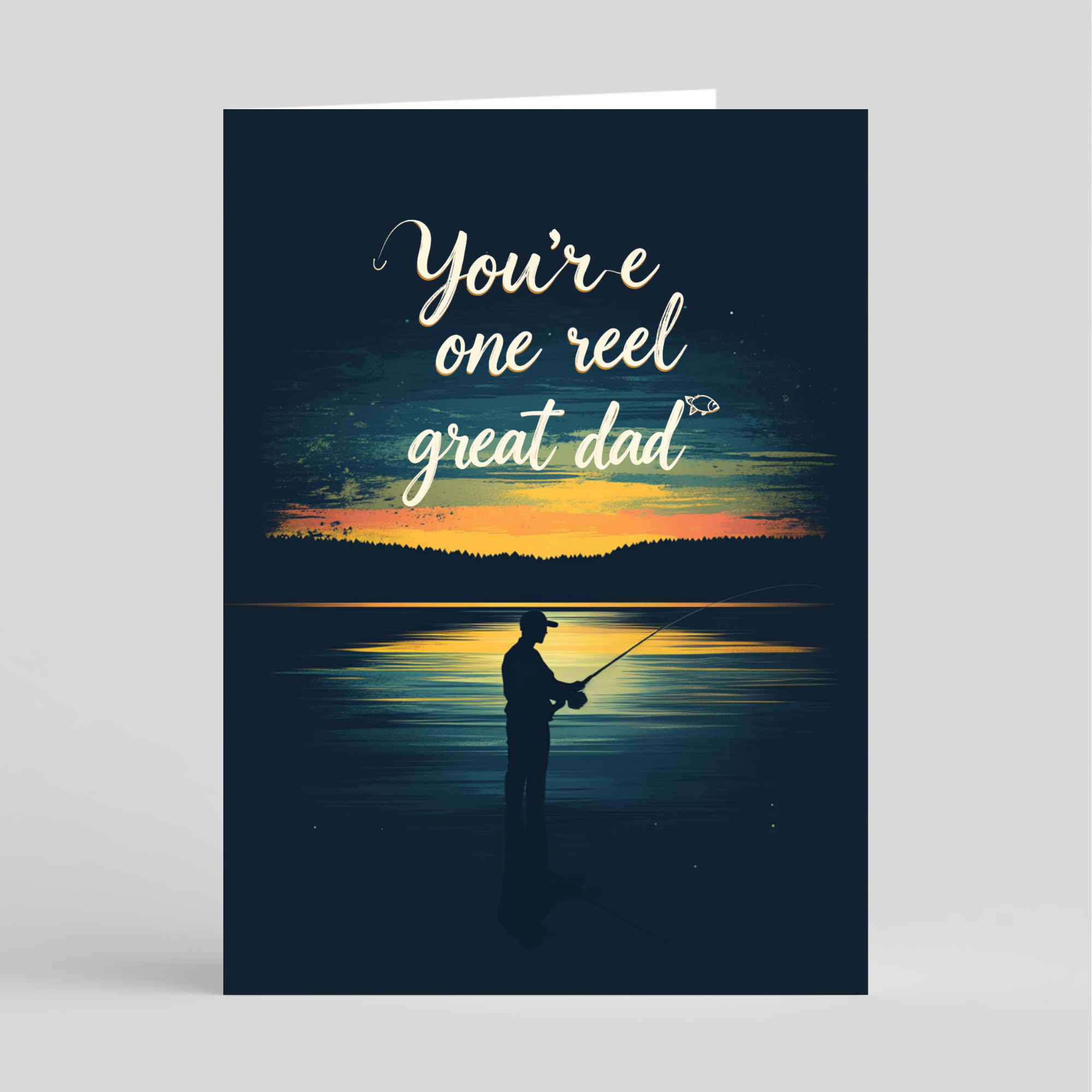Greeting card with a silhouette of a person fishing at sunset and text 'You're one reel great dad' on a dark blue background.