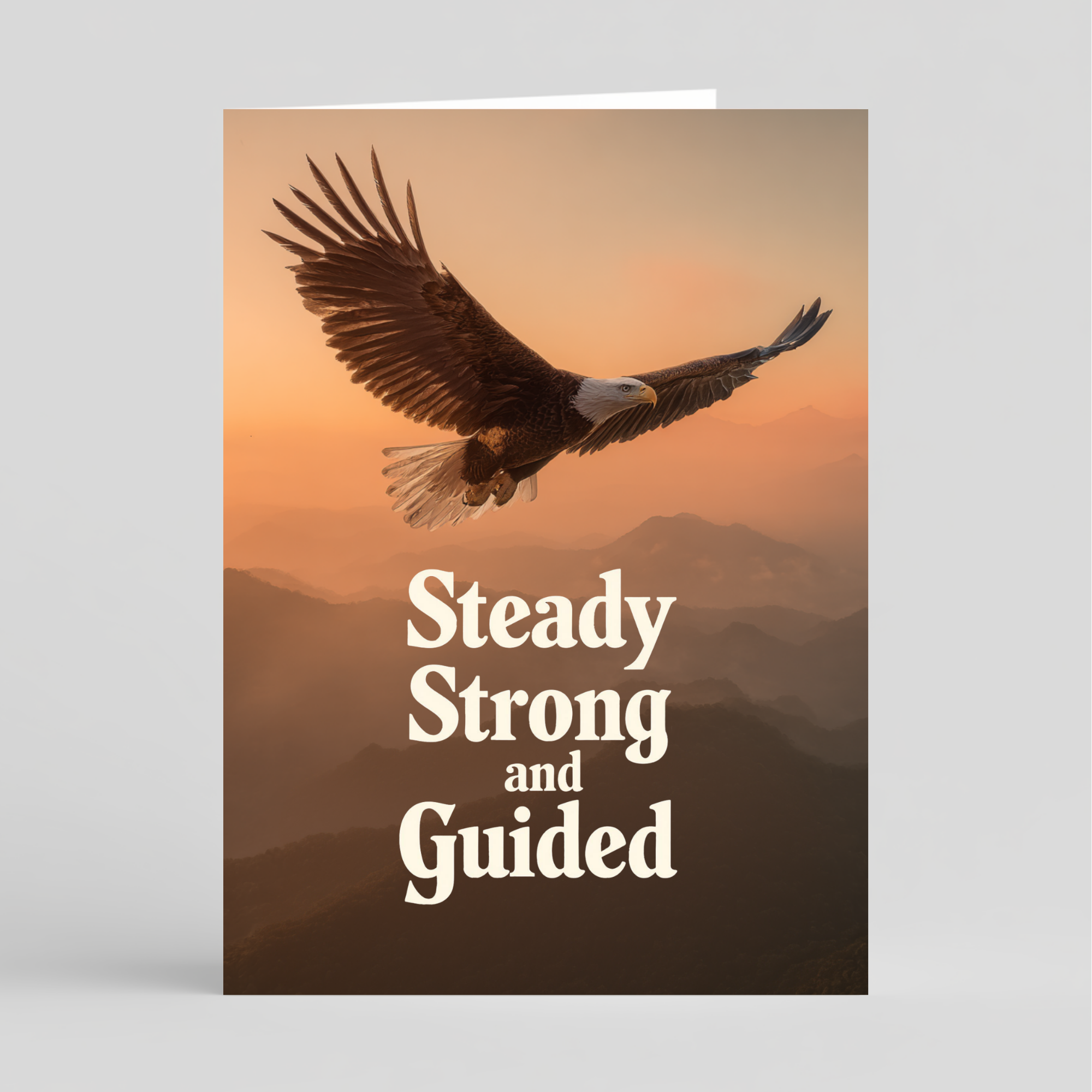 Card with an eagle flying against a sunset mountain backdrop and text 'Steady Strong and Guided'.